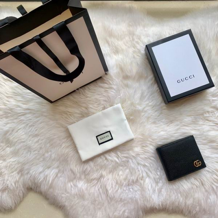 G*u*i wallet 428726 11*9